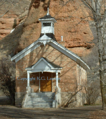 Rock Church by a Rock Cliff